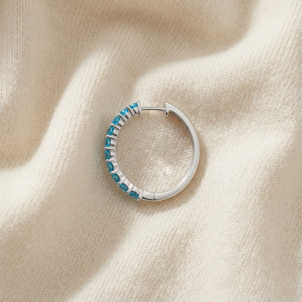 14K Gold 2.40ctw Blue Topaz Hoop Earrings in 14K White Gold - flat lay