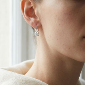 Diamond Lever Back Earrings in 14K White Gold, worn close-up portrait