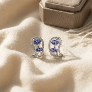 Tanzanite & Diamond Open Work Earrings in 14K White Gold - flat lay