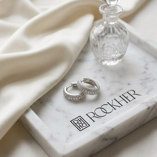 Diamond Pavé Hoop Earrings in 14K White Gold, on marble vanity tray with silk