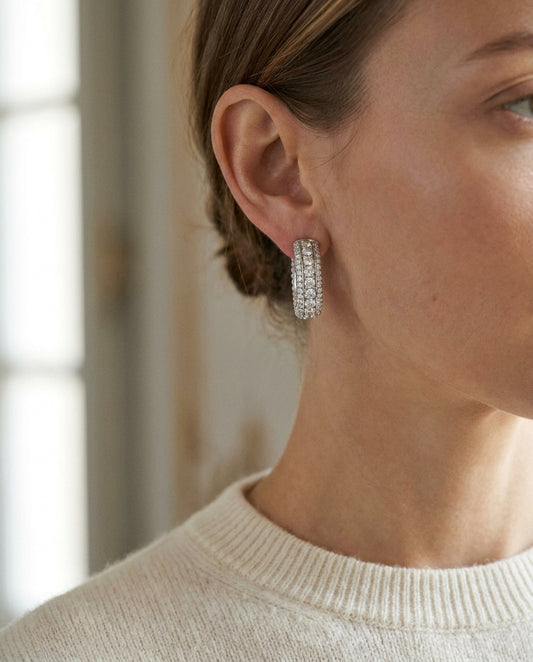 Diamond Hinged Back Huggie Hoop Earrings in 14k White Gold 0.42ctw, worn close-up portrait