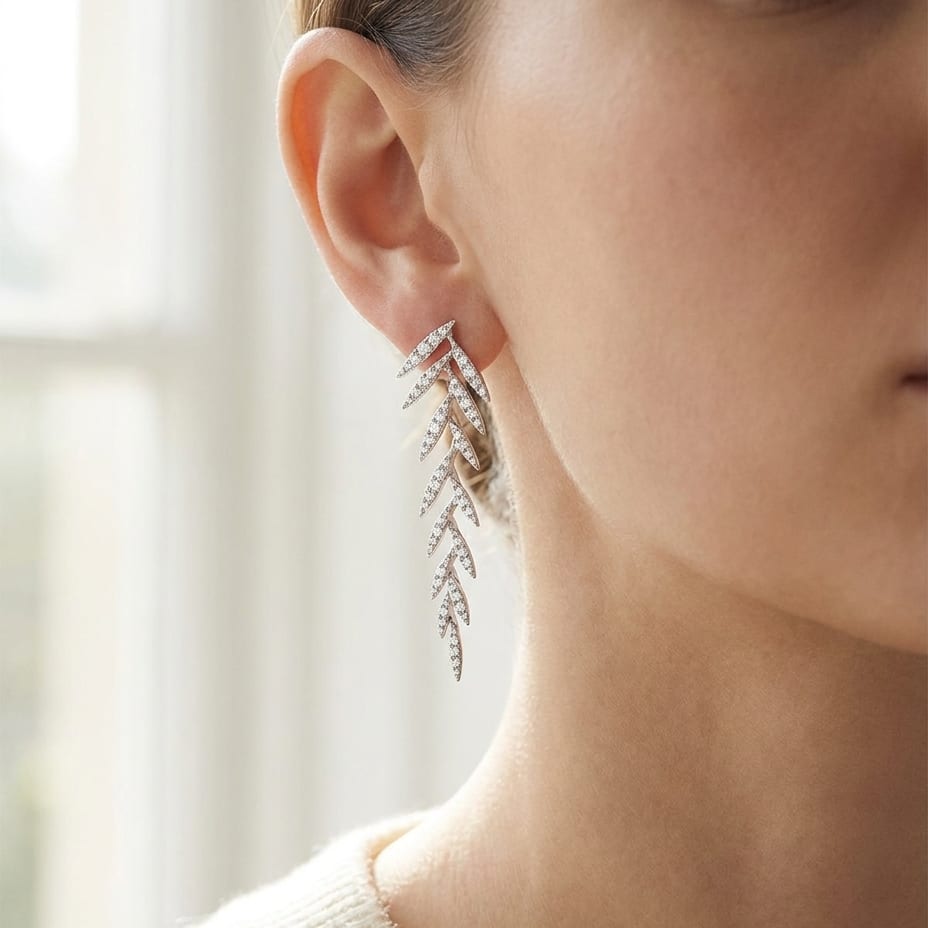 Diamond Pave Laurel Leaves Dangling Earrings in 14K White Gold, worn close-up portrait