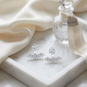 Fan Shaped Earring Cuff in 14K White Gold, on marble vanity tray with silk