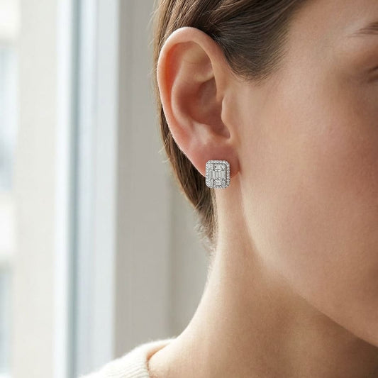 Emerald Round Brilliant Stud Earrings in 14K White Gold, worn close-up portrait