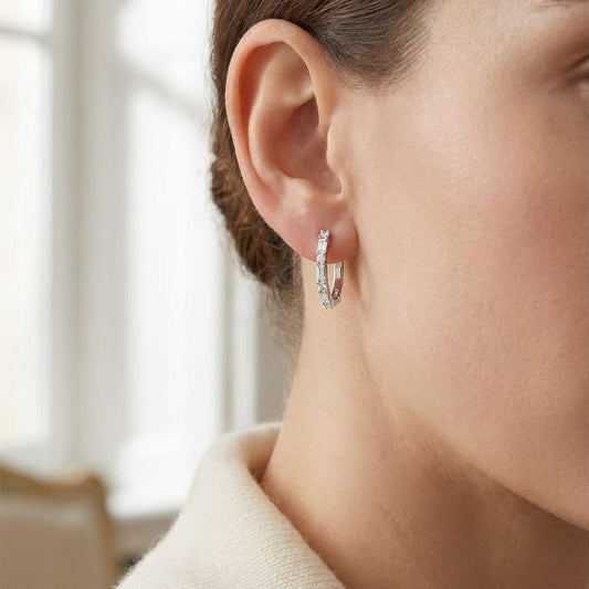 Diamond Baguette And Round Hoop Earrings in 14K White Gold, worn close-up portrait