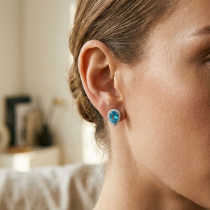 Blue Topaz & Diamond Halo Teardrop Earrings 0.18ctw in 14K White Gold - editorial