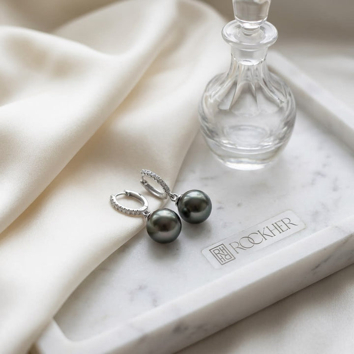Black Pearl And Diamond Straight Dangle Earrings With Huggie Closures in 14K White Gold (8.0-8.5mm) (si), on marble vanity tray with silk