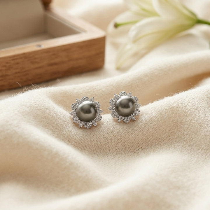Tahitian Pearl & Diamond Earrings with Arabesque Border in 14K White Gold - flat lay