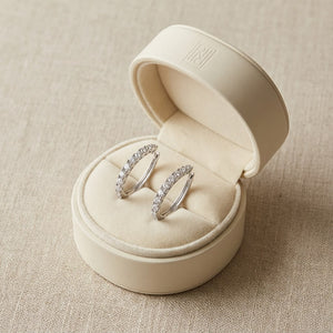 Diamond Pave Single Row Outside Oval Hoop Earrings in 14K White Gold, in navy velvet jewelry box