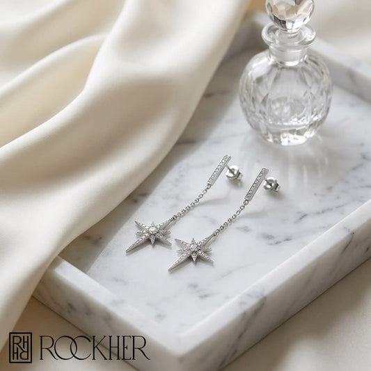 Diamond Pave Polaris Dangle Earrings With Bar Posts in 14K White Gold, on marble vanity tray with silk