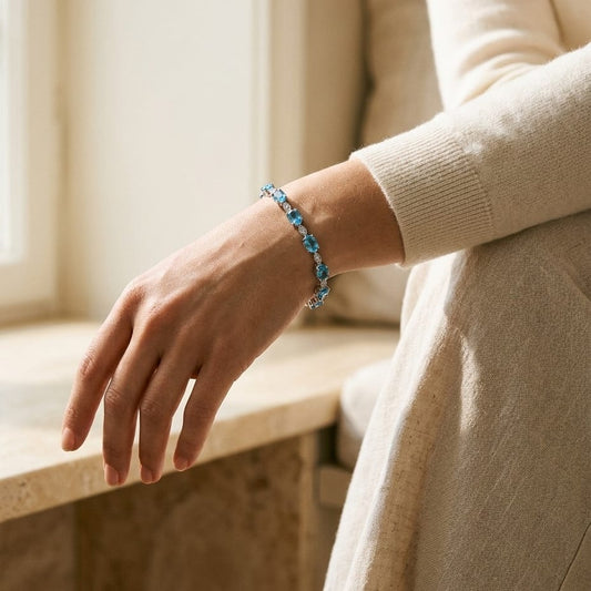 Blue Topaz Oval Half-Bezel & Diamond Pave East-West Bracelet in 14K White Gold - editorial