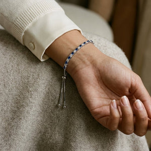 Alternating Sapphire and Diamond Bolo Bracelet in 14k White Gold 2.13ctw, worn close-up portrait