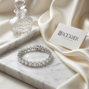 Certified 14K White Gold 3-prong Lab Created Round Brilliant Diamond Tennis Bracelet, on marble vanity tray with silk