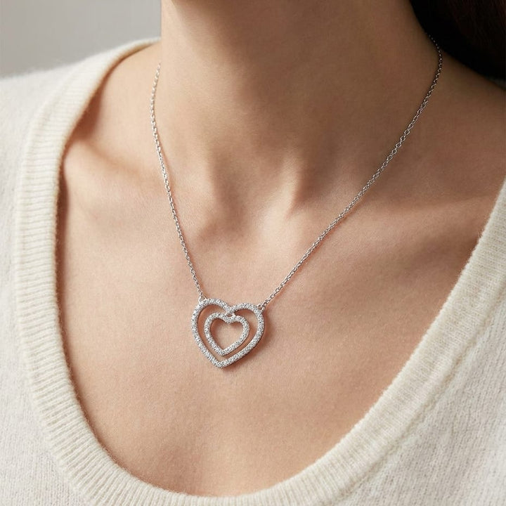 Diamond Double Heart Frame Necklace in 14K White Gold, worn close-up portrait