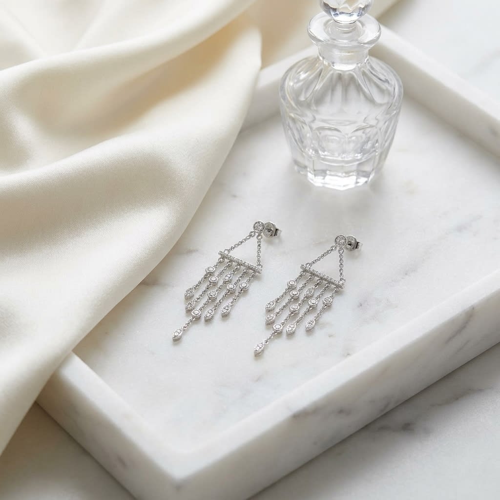 Diamond Wind Chime Dangle Necklace in 14K White Gold, on marble vanity tray with silk