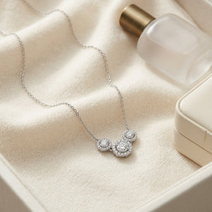 Diamond Three Stone Halo Necklace in 14K White Gold - flat lay