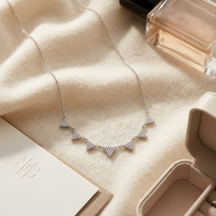 Diamond Pave 7-Triangle Necklace 16-18 Inch Adjustable Length in 14K White Gold - flat lay