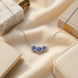 Tanzanite & Diamond Round Halo Trio Necklace in 14K White Gold - flat lay