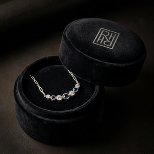 Sapphire & Diamond Graduated 7-Stone Necklace with Millgrained Edging in 14K White Gold - presentation