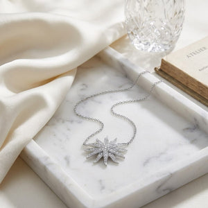 Diamond Pave Aqua Star Necklace in 14K White Gold, 16-18 Inch Adj Chain, on marble vanity tray with silk