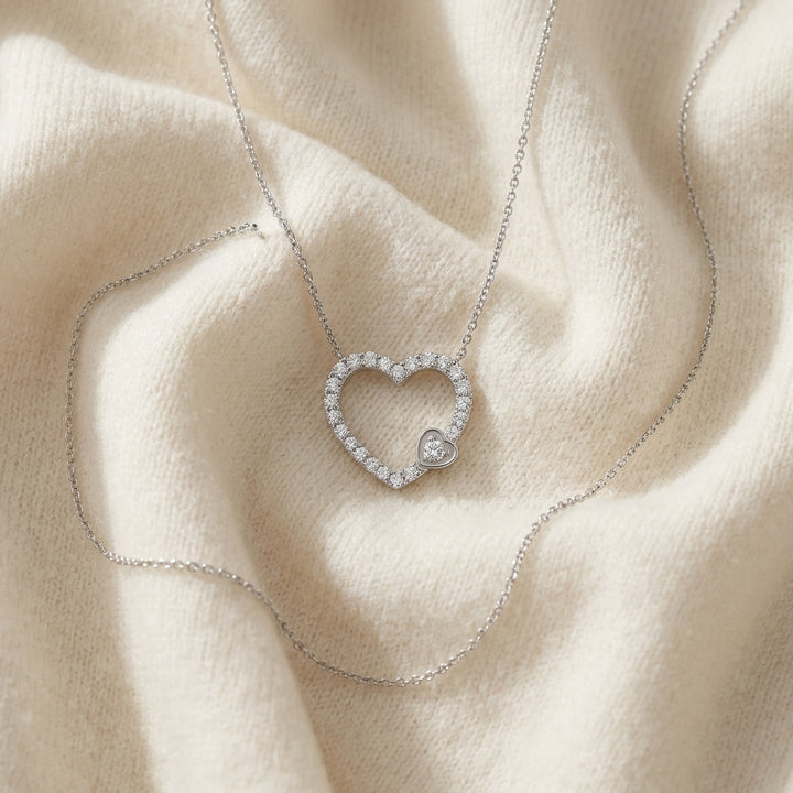 Diamond 1/2ctw Heart Necklace with 16/18 Adj Chain Set in 14K White Gold - flat lay