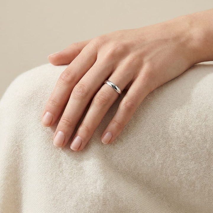 3mm Slightly Domed Traditional Oval Wedding Band in 14K White Gold, worn on hand, full view