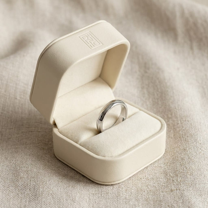 3mm Slightly Domed Traditional Oval Wedding Band in 14K White Gold, in navy velvet jewelry box