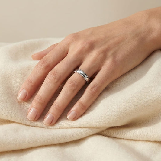4mm Slightly Domed Traditional Oval Milgrain Wedding Band in 14K White Gold, worn on hand, full view
