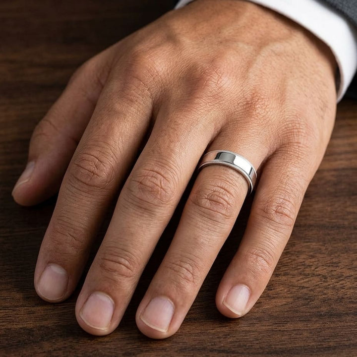 6mm Flat Milgrain Comfort-Fit Wedding Band in 14K White Gold, worn on hand, masculine close-up