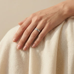 4mm Slightly Domed Milgrain Comfort-Fit Wedding Band in 14K White Gold, worn on hand, full view