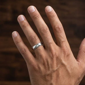 5mm Slightly Domed Milgrain Comfort-Fit Wedding Band in 14K White Gold, worn on hand, masculine close-up