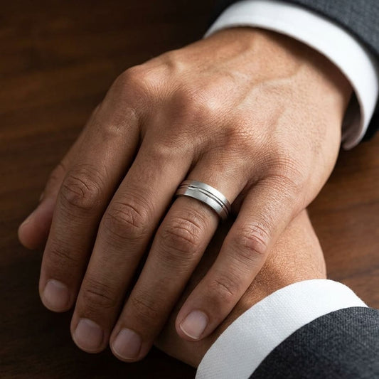 6mm Satin Finish High Polished Center Cut Carved Wedding Band in 14K White Gold, worn on hand, masculine close-up