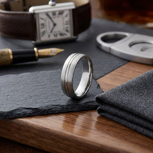 6mm Satin Finish High Polished Center Cut Carved Wedding Band in 14K White Gold, on walnut surface with pocket square