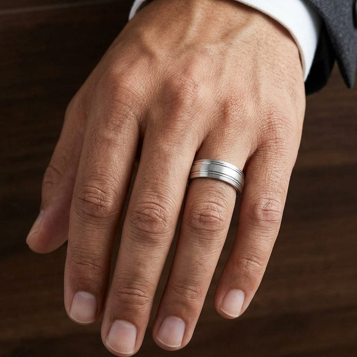 7mm Satin Finish Parallel Groove Carved Wedding Band in 14K White Gold, worn on hand, masculine close-up