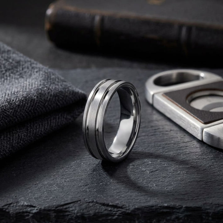 6mm Satin Finish Parallel Groove Carved Wedding Band in 14K White Gold, on walnut surface with pocket square