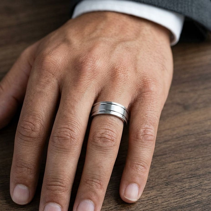 8mm Satin Finish Parallel Groove Carved Wedding Band in 14K White Gold, worn on hand, masculine close-up