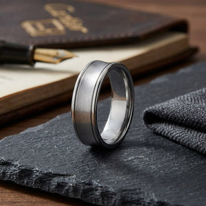 7.5mm Satin Finish High Polished Round Edge Carved Wedding Band in 14K White Gold, on walnut surface with pocket square