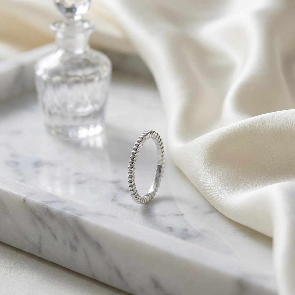 2mm Comfort-Fit Wedding Band in 14K White Gold, on marble vanity tray with silk
