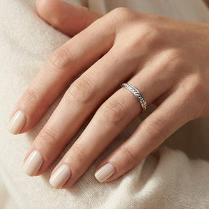 2mm High Polish Carved Wedding Band in 14K White Gold, worn on hand, close-up
