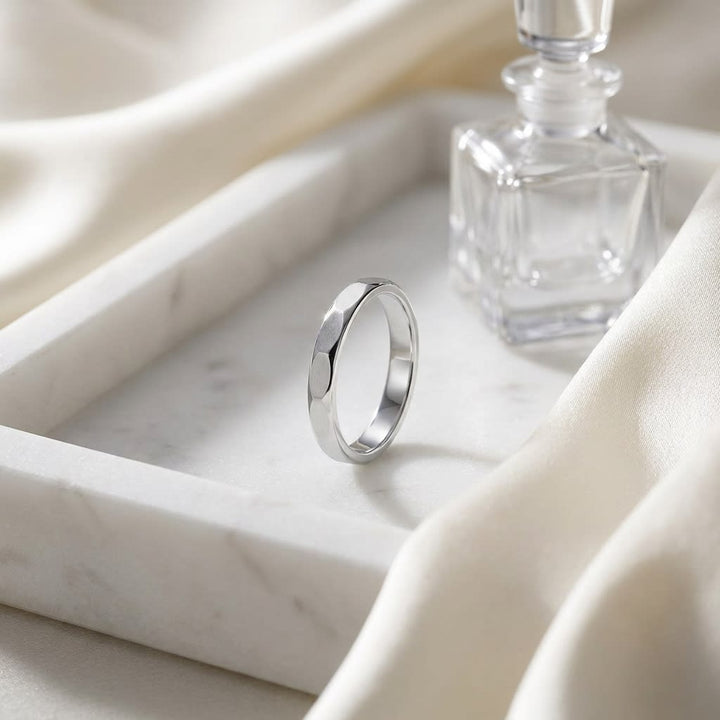 2mm High Polish Carved Wedding Band in 14K White Gold, on marble vanity tray with silk