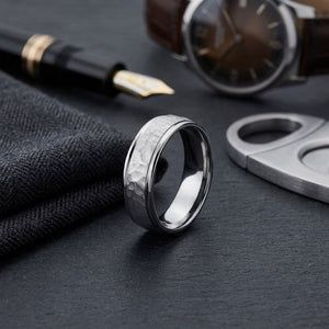 6mm Hammered Finish Carved Wedding Band in 14K White Gold, on walnut surface with pocket square