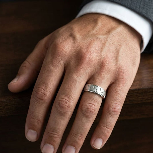 8mm Satin Finish Carved Wedding Band in 14K White Gold, worn on hand, masculine close-up