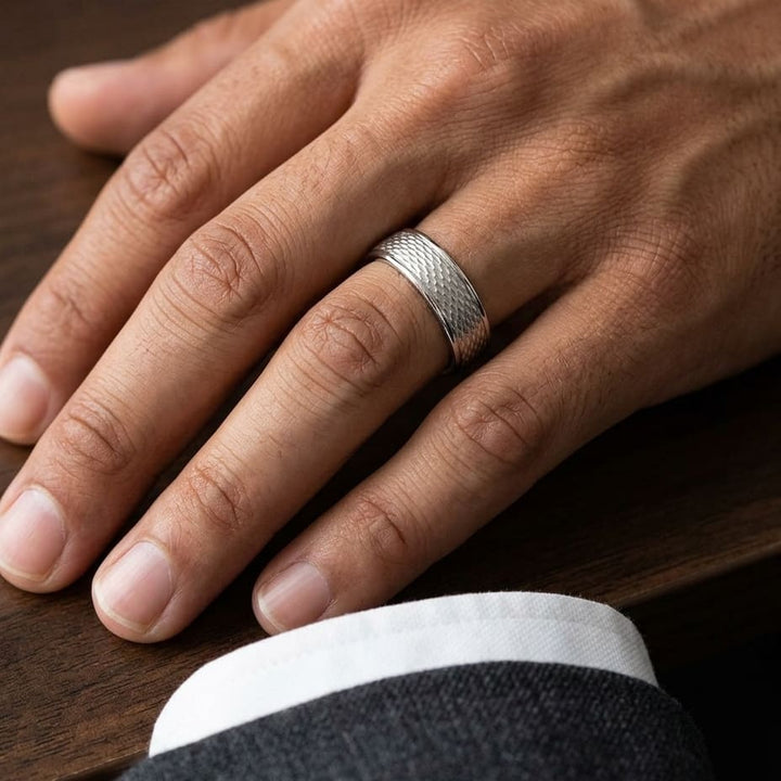 7.5mm Round Edge Mesh Center Carved Wedding Band in 14K White Gold, worn on hand, masculine close-up