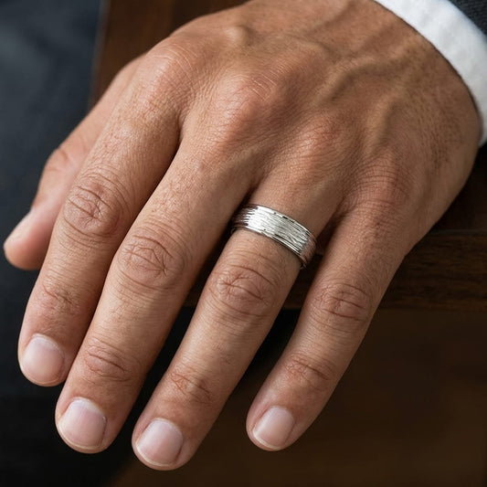 7.5mm Comfort-Fit Wedding Band in 14K White Gold, worn on hand, masculine close-up