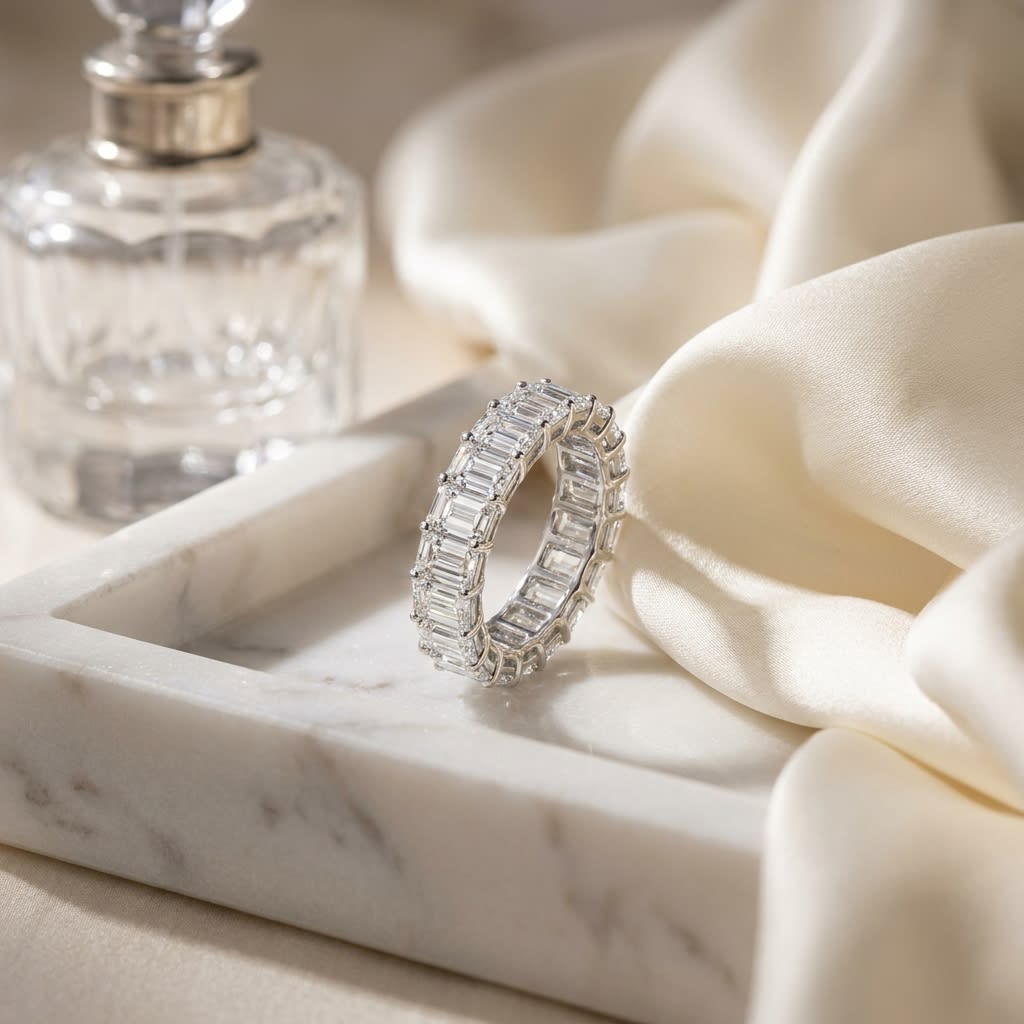 Emerald Cut Lab Diamond Eternity Band, on marble vanity tray with silk