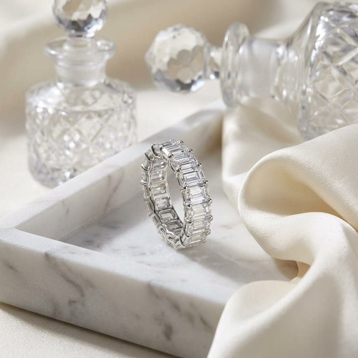 Emerald Cut Natural Diamond Eternity Band, on marble vanity tray with silk