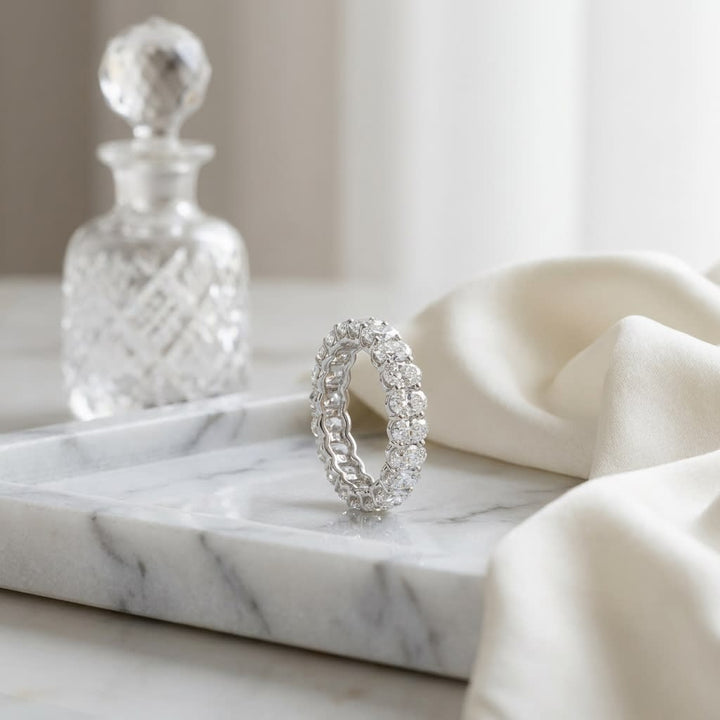Oval Cut Natural Diamond Eternity Band, on marble vanity tray with silk