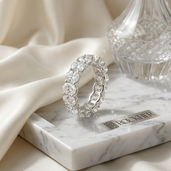 Oval Cut Lab Diamond Eternity Band, on marble vanity tray with silk