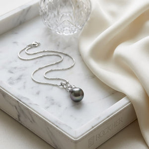South Sea Pearl Pear Shape Pendant in 14K White Gold, on marble vanity tray with silk