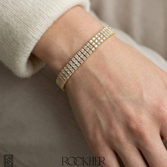 Diamond Round 4-prong Triple Row Bracelet in 14K Yellow Gold, worn close-up portrait